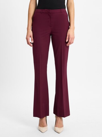 Ipuri Flared Trousers with creases in Red: front