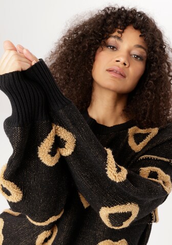 Aniston Pullover in Schwarz