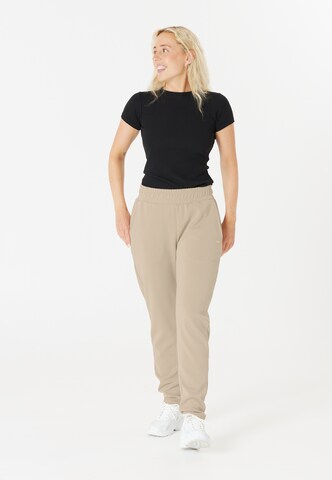 Athlecia Tapered Sports trousers 'Jillnana' in Brown