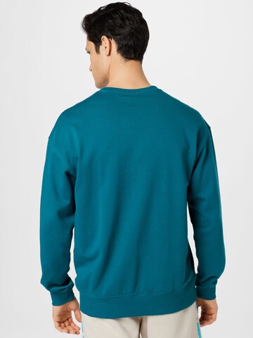 ADIDAS SPORTSWEAR - Sweatshirt de desporto em azul