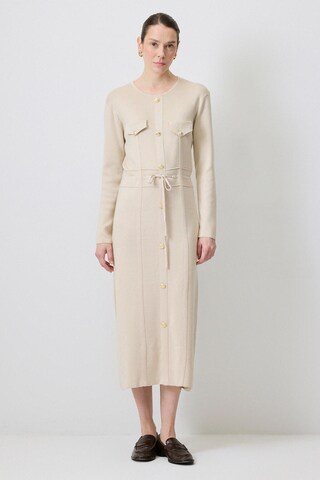 Touche Prive Knit dress in Beige: front