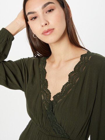 ABOUT YOU Blouse 'Binia' in Groen