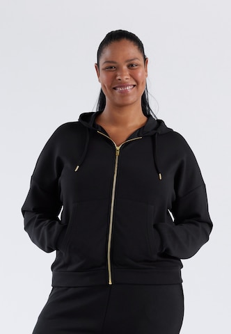 Q by Endurance Zip-Up Hoodie in Black: front