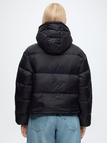 Calvin Klein Jeans Vinterjacka 'ESSENTIAL' i svart