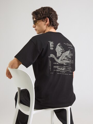 T-Shirt 'Punched' Carhartt WIP en noir : devant