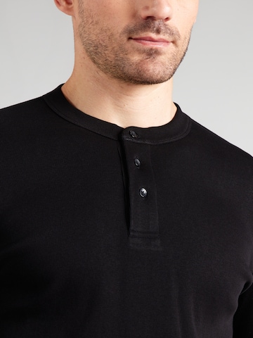 ARMANI EXCHANGE - Camiseta en negro