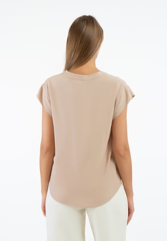 RISA - Blusa en beige