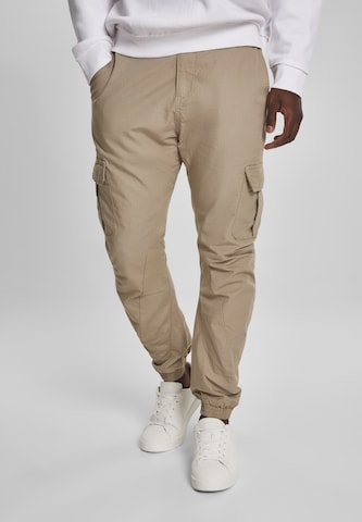 Urban Classics Tapered Cargo trousers in Beige: front