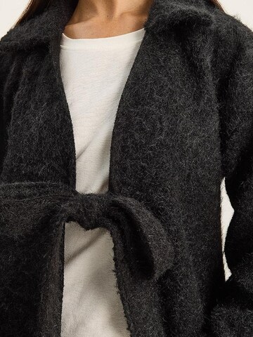 Cardigan Bianco Lucci en noir