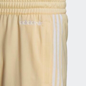 regular Pantaloni 'Straight' di ADIDAS ORIGINALS in giallo