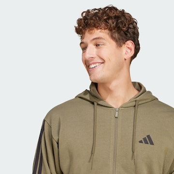 ADIDAS SPORTSWEAR Αθλητική ζακέτα φούτερ 'Essentials' σε πράσινο