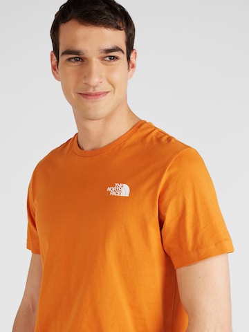 THE NORTH FACE - Camiseta 'REDBOX CELEBRATION' en naranja