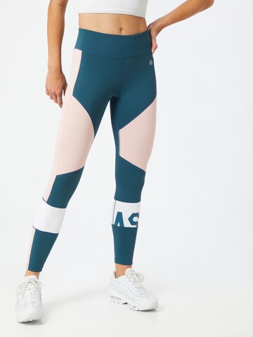 Skinny Pantalon de sport ASICS en bleu : devant