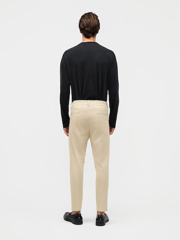 smėlio DRYKORN Standartinis Kelnės su kantu 'CHASY'