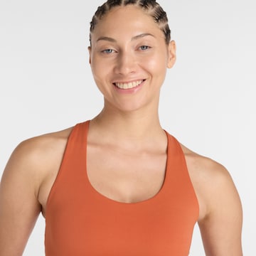 new balance - Soutien Bustier Soutien de desporto em laranja