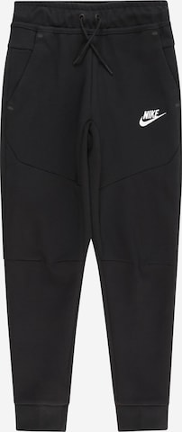 Nike Sportswear Tapered Pants in Black: front