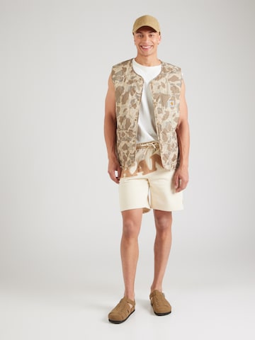 Karl Kani Regular Pants in Beige