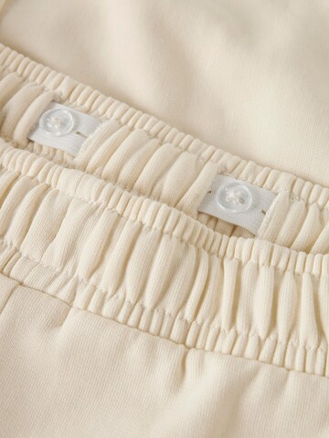 Loosefit Pantalon fonctionnel 'Nizu' LMTD en blanc