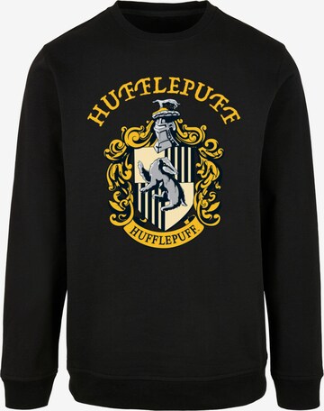 Felpa 'Harry Potter - Hufflepuff Crest' di ABSOLUTE CULT in nero: frontale