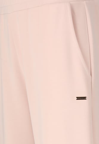 Athlecia Tapered Sportbroek 'Jillnana V2' in Rood