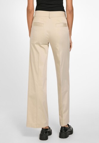 St. Emile Boot cut Pleated Pants in Beige