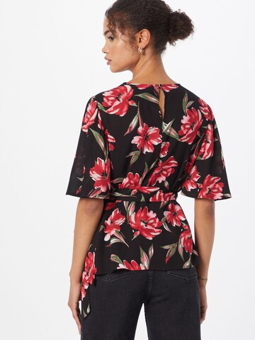 La petite étoile Blouse in Zwart