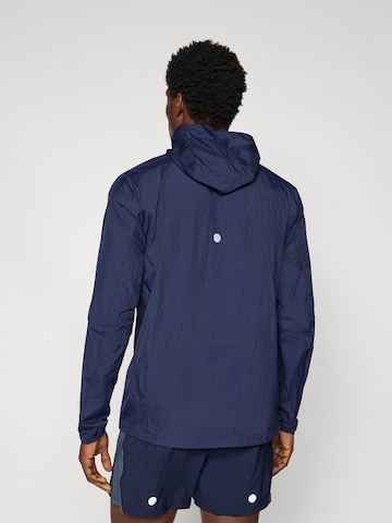 ASICS Sportjacke 'ROAD PACKABLE' in Blau