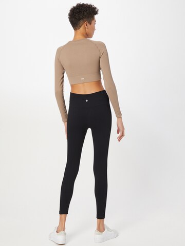 Athlecia Skinny Sportbroek in Zwart