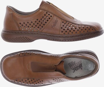 Rieker Flats & Loafers in 44 in Brown: front