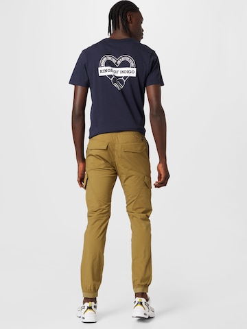 TOM TAILOR DENIM Tapered Hose in Grün