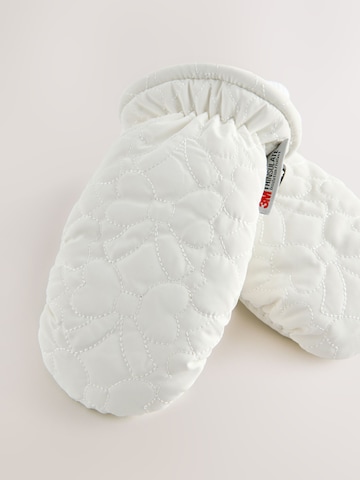 Next - Guantes en blanco