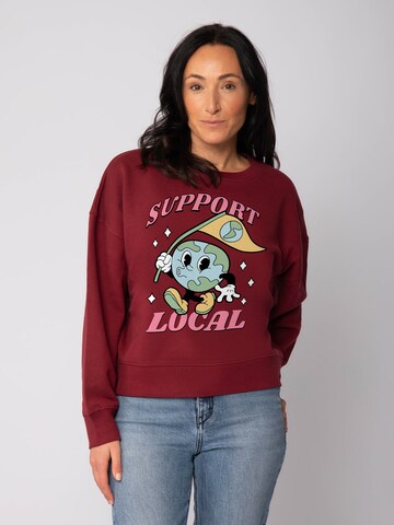 Watapparel Sweatshirt 'Support Local ' in Rot: Vorderseite