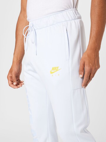 Tapered Pantaloni sport 'Air' de la Nike Sportswear pe albastru