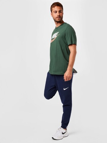 NIKETapered Sportske hlače - plava boja