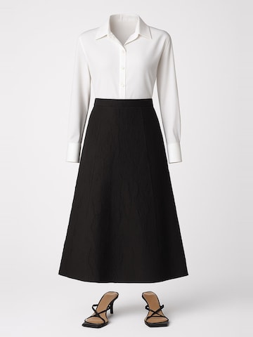 Touche Prive Skirt in Black: front