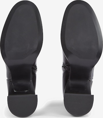 Botine de la Calvin Klein pe negru