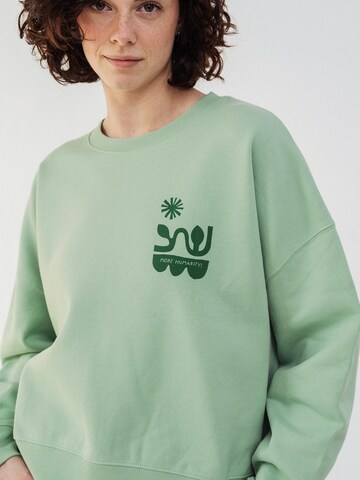 Kultgut Sweater 'More Humanity.' in Green: front