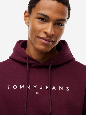 Sweat-shirt 'TJM REG LINEAR LOGO DM0DM20746' Tommy Jeans en rouge