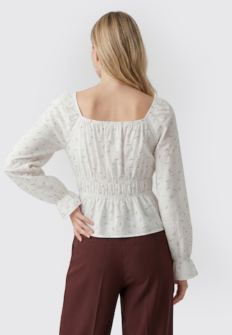 Usha - Blusa en blanco