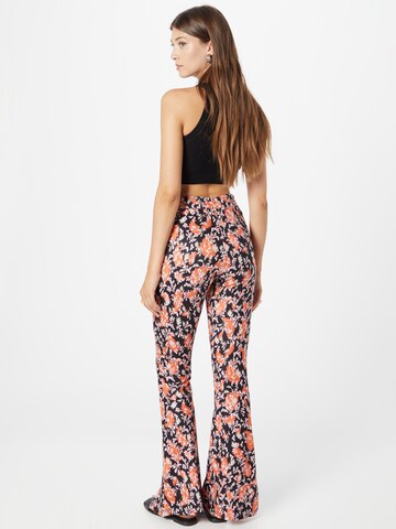 Colourful Rebel Flared Pants 'Darcy' in Orange