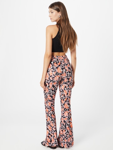 Colourful Rebel Flared Pants 'Darcy' in Orange