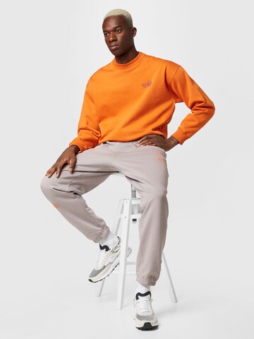 ELLESSE Sweatshirt 'Bloccare' in Oranje