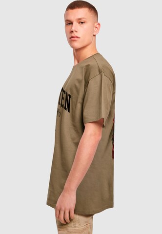 Forgotten Faces T-shirt 'Overgrown Skull' i grön