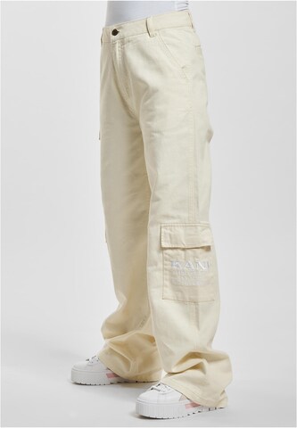 Karl Kani Loose fit Cargo Pants in Beige: front