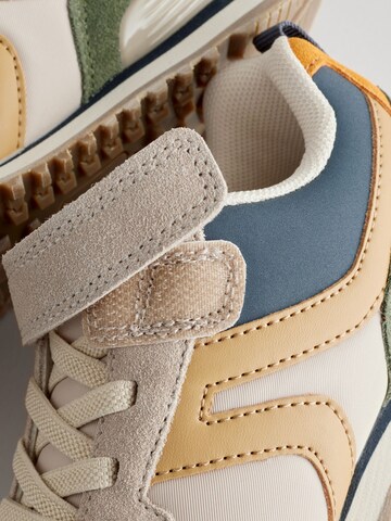 Baskets Next en beige