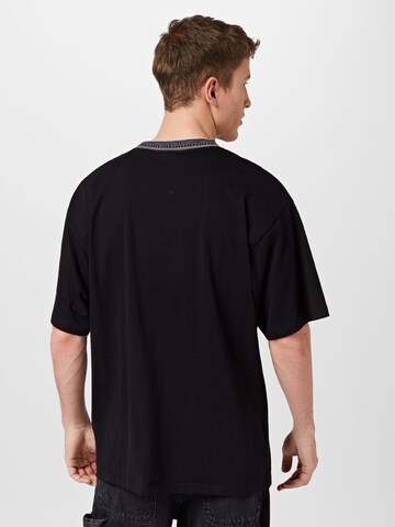 Tricou de la Grimey pe negru