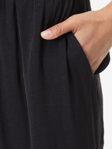 ABOUT YOU Zwężany krój Spodnie 'Jiline' w kolorze czarny