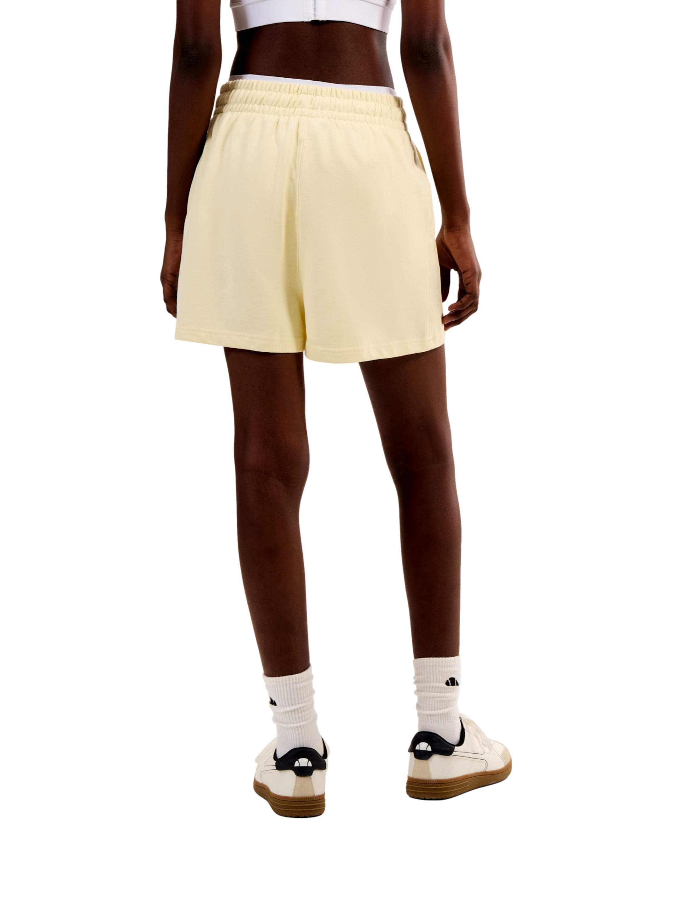 Loosefit Pantaloni sportivi di ELLESSE in giallo