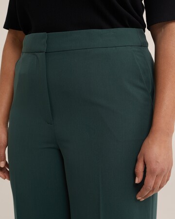 WE Fashion Wide leg Trousers with creases in Green