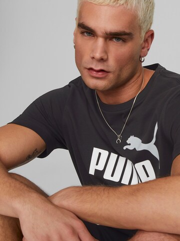 PUMA Functioneel shirt 'Essentials' in Zwart